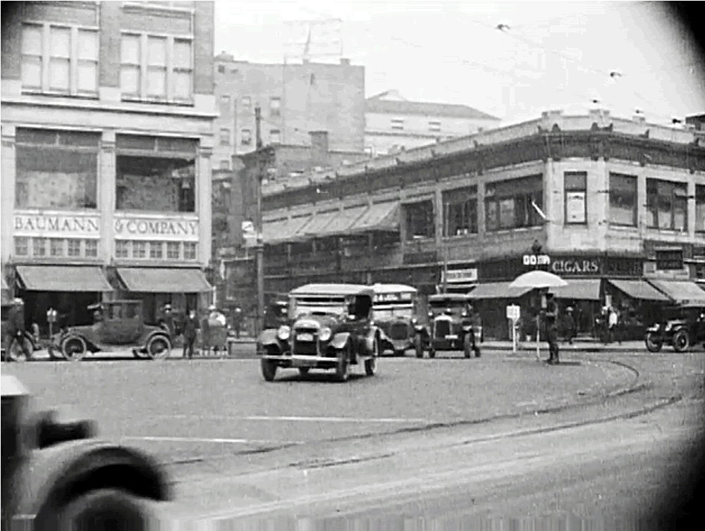 Broad Street & Central Avenue
Notice the policeman under the umbrella directing traffic.
