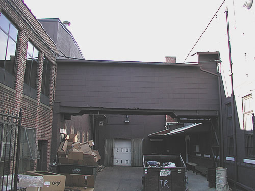 Alley with Walkway Bridge
