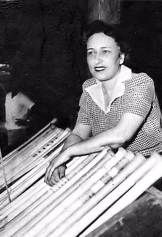 Owner Effa Manley
Negro League Newark Eagles baseball team owner Effa Manley poses with bats in the dugout in Ruppert Stadium in Newark, New Jersy in 1948. 

Photo by Mark Rucker

